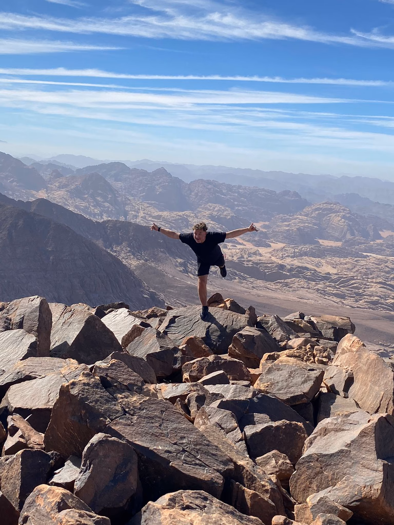 Our guest posing on top of Jabal Um Adami, Wadi Rum, Jordan