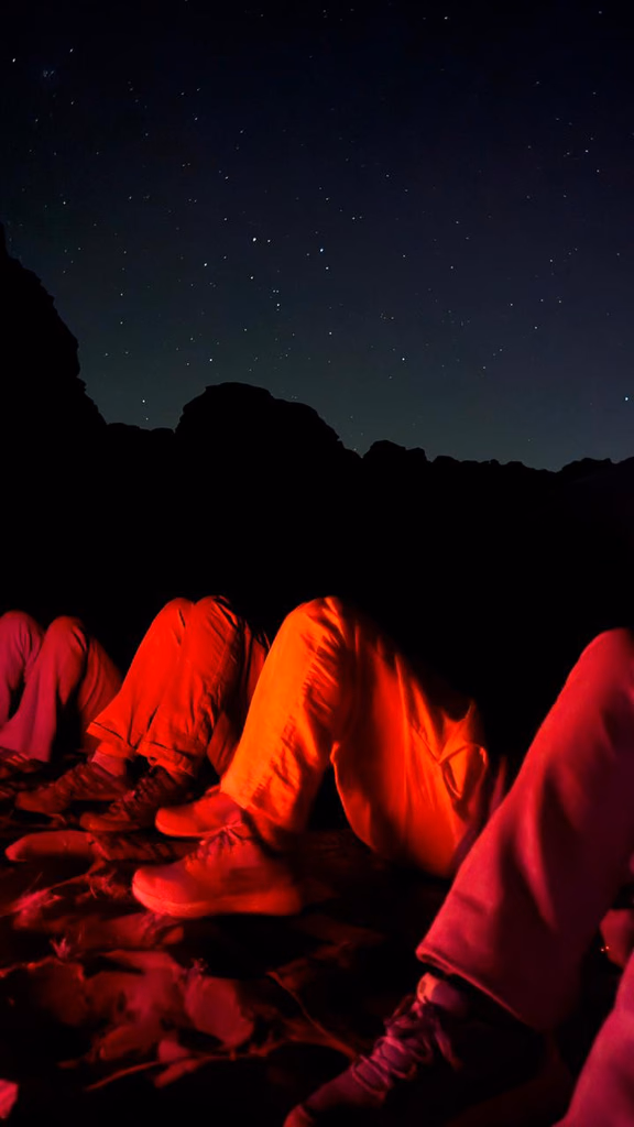 guests watching the sky during the night tour, wadi rum jordan