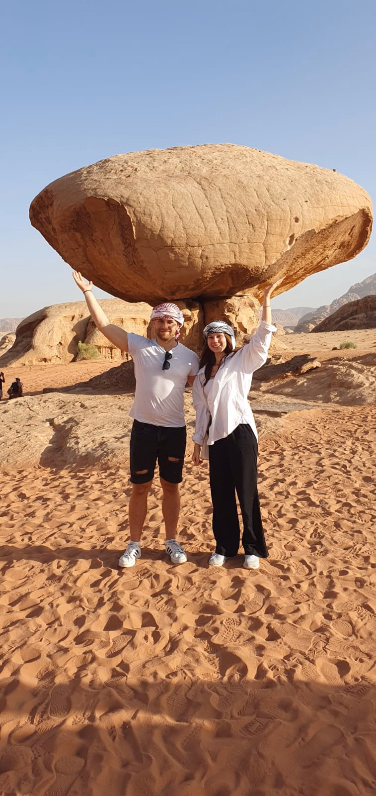 Wadi Rum Desert Mushroom Rock with a young couple