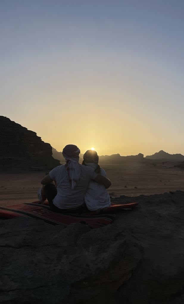 Couple at sunrise in Wadi Rum