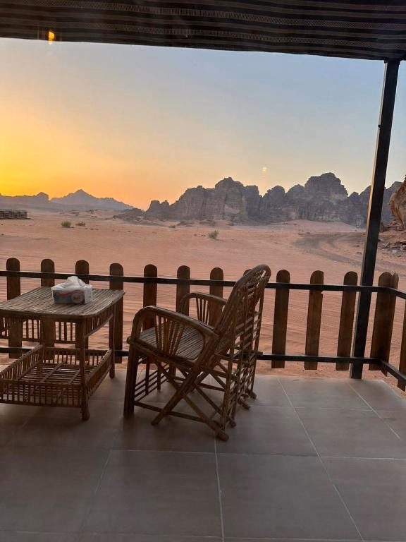 Desert view through the panoramic window from our Bedouin Camp House