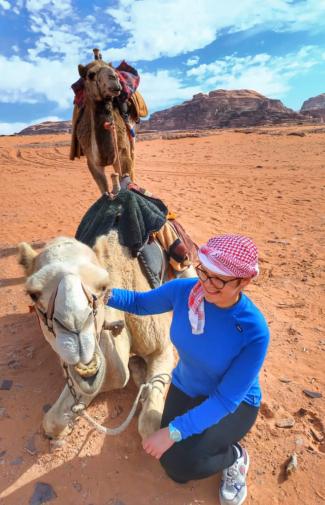 Guest greeting a camel