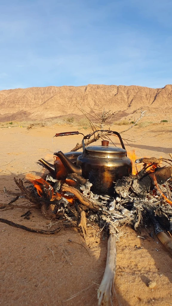 Campfire Bedouin Tea in the wadi rum desert, jordan