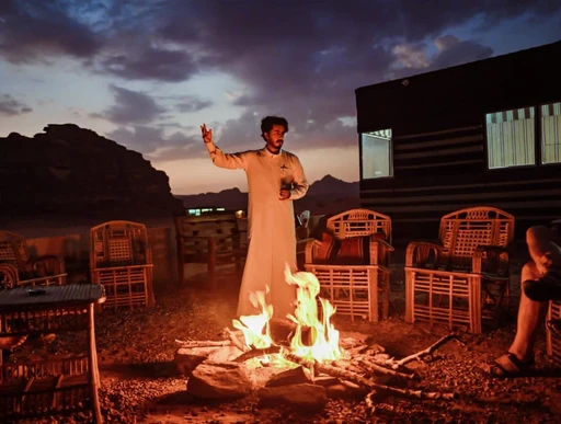 Ahmad - Bedouin guide telling stories by the campfire in our camp Wadi Rum, Jordan