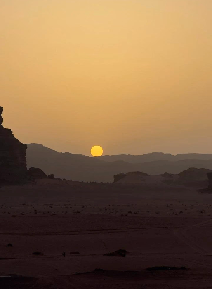 Yellow sky at sunset in wadi rum, jordan